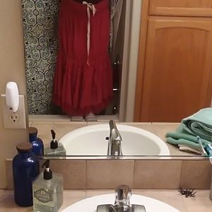 Long red western looking skirt by: Raaga